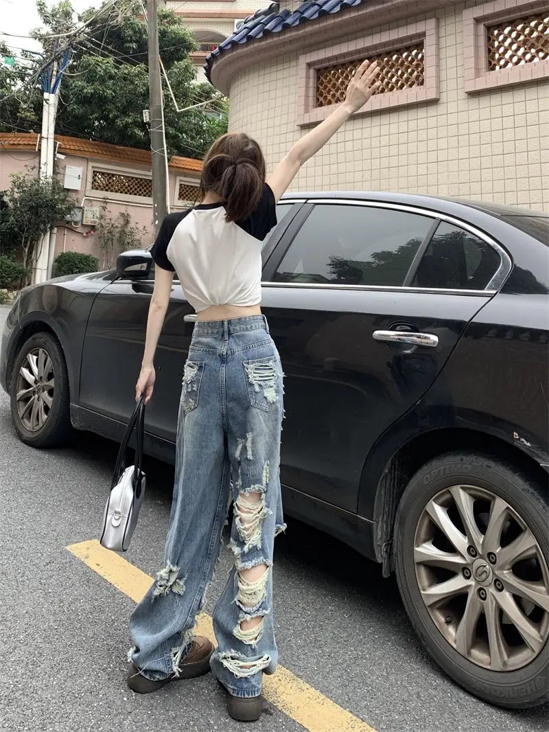 Ripped high-waist wide-leg jeans