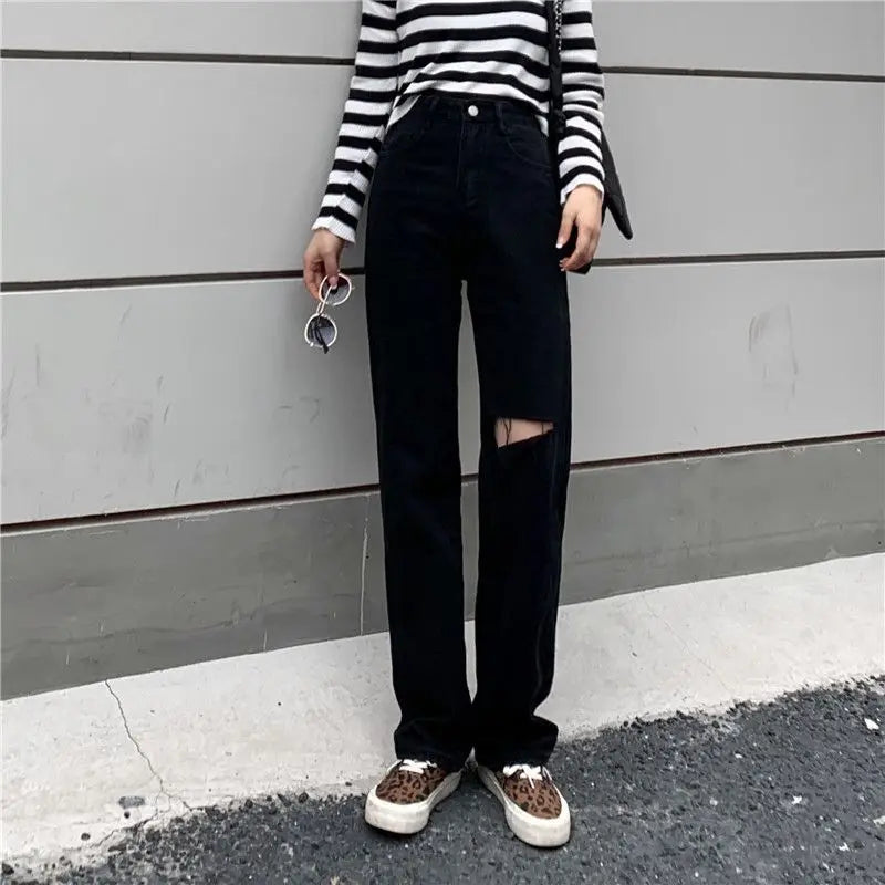 Ripped high-waist wide-leg jeans