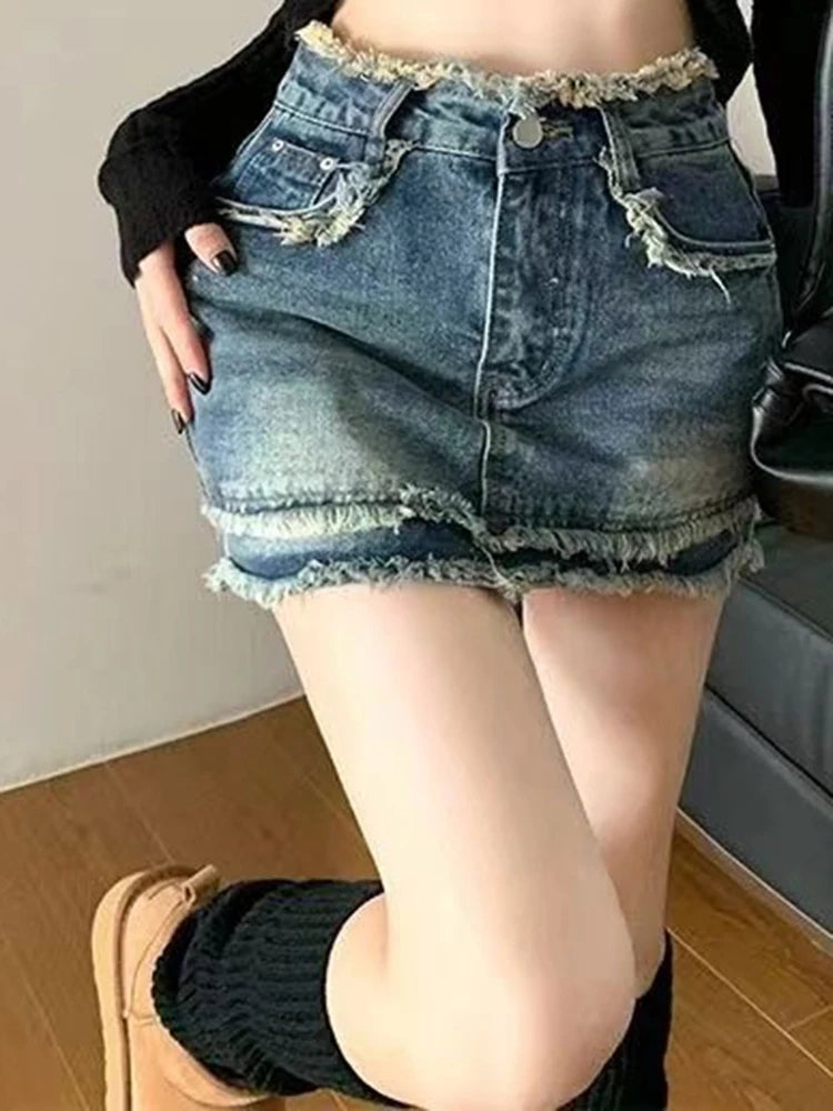 High-waist denim skirt with tassel edge